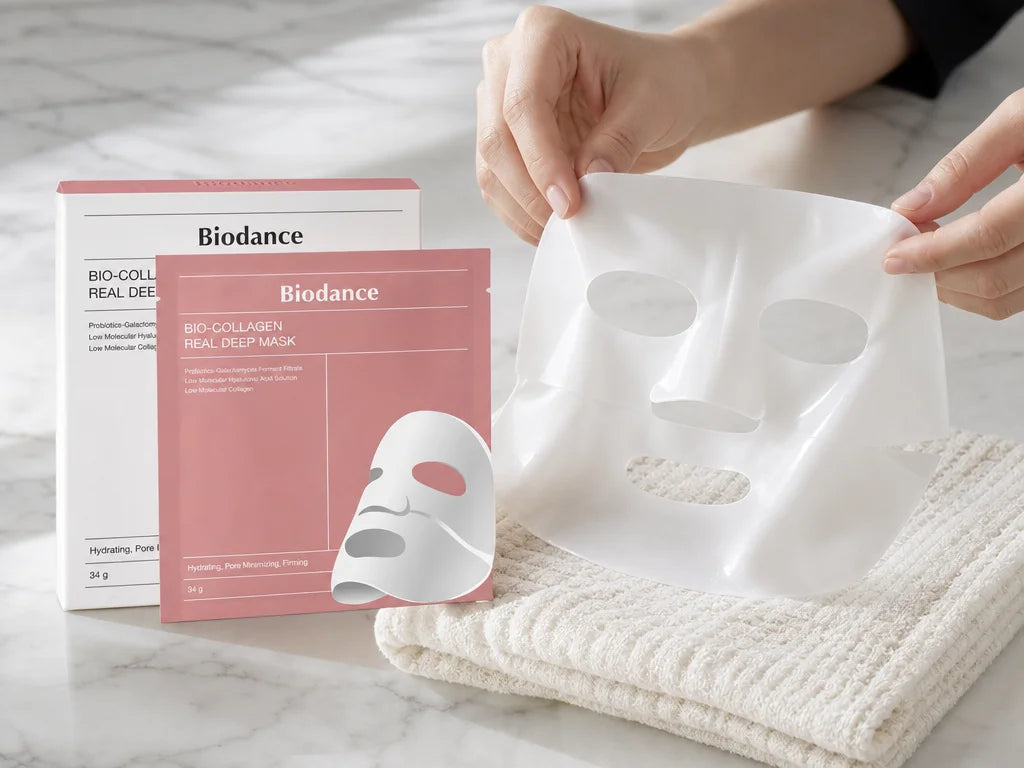 Tactile editorial beauty photograph for a 4:3 collection card, showing the exact Biodance BIO-COLLAG
